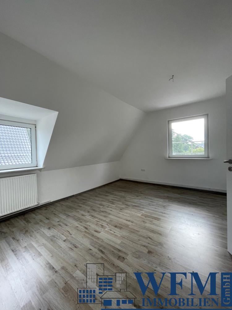 Eins von 3 Schlafzimmern im Dachgeschoss